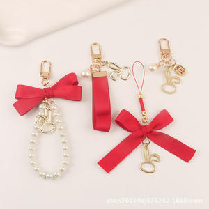 Nouvelle perle ruban porte-clés pendentif créatif alliage lapin accessoires frais étui pour écouteurs sac décoration - Product Image 1