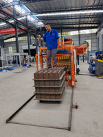 Machine de chargement QT6-15 pour la fabrication de blocs de béton emboîtables sur palette