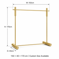 Porte-vêtements simple en acier inoxydable doré brossé, avec barre de base stabilisatrice et joints soudés sans couture, personnalisable OEM/ODM pour boutique de vêtements