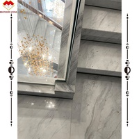 Marches de luxe en pierre blanche volakas escalier en marbre carreaux de marches d'escalier incurvés polis d'hôtel à vendre