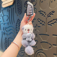 Dessin animé loutre en peluche porte-clés pendentif poupée créative pour étudiant sac d'école petit Couple cadeau en gros