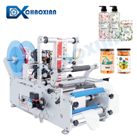 Machine d'étiquetage avec ruban adhésif pour bouteilles rondes, contenants de cuisine, machine d'étiquetage de bureau