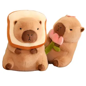 Capybara ตุ๊กตาของเล่นกับขนมปังปิ้งดอกไม้หนู capybara plushie ในไดโนเสาร์ยูนิคอร์นอโวคาโดตุ๊กตากระต่าย