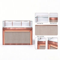 Comptoir de présentation de bijoux en verre LED or rose de luxe avec panneau en tissu pour magasin de vente de bijoux