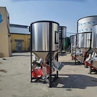 Mélangeur vertical automatique industriel en acier inoxydable pour aliments pour volailles, capacité 1 tonne/h, granulométrie des granulés 0,5-2 mm, haute tension 220/380V
