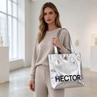 Vente en gros de sacs de shopping pour femmes en argent métallisé de 15 pouces, sac fourre-tout imperméable en PU, grande capacité, sac de plage pour les voyages