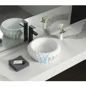Penjualan langsung pabrik desain Modern wastafel kamar mandi keramik bulat seni konter atas bak cuci