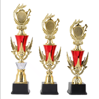 Piala Kompetisi Plastik untuk Lomba Puisi, Lomba Matematika, Lomba Lukis, dan Piala Kenangan Anak-Anak