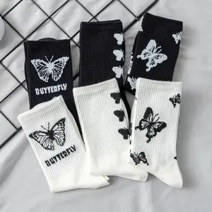 Wholesale customized logo mid calf socks black and white nylon butterfly pattern women's mid length stockings