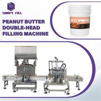 Machine de remplissage et de bouchage semi-automatique à double tête haute précision, à volume réglable, pour pâtes, miel et produits alimentaires en verre