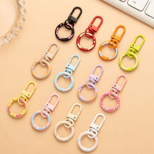 Llavero de donut de acero inoxidable en colores caramelo para bolso, correa de teléfono, juego de juguetes DIY - Product Image 1