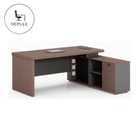 Bureau de direction ergonomique convertible en forme de L avec armoire de rangement, adapté aux bureaux d'entreprise et aux zones de réception.