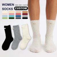 Chaussettes mi-mollet douces et confortables en mélange de laine pour femme, avec étiquette décorative, idéales pour l'hiver, vente en gros personnalisée