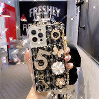 Coque de téléphone pour Apple 15/16/17 Pro avec flacon de parfum en strass, compatible avec iPhone 17 - protection florale entièrement ornée de diamants 14/13