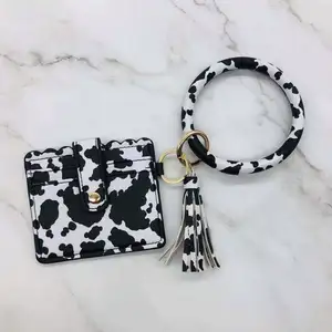 Porte-clés pompon en daim Portefeuille en cuir PU Cartes de crédit en cuir PU imprimé vache léopard