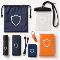 Kit cadeau personnalisé pour la préparation aux ouragans avec lampe de poche, batterie externe, poncho, sifflet, serviette et pochette étanche