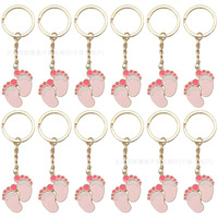 Nouveaux accessoires de mode DIY en métal pour porte-clés et breloques de sac, pendentifs de porte-clés motif dessin animé avec motif bouteille de bébé et empreinte de pied, finition goutte d'huile bleu rose