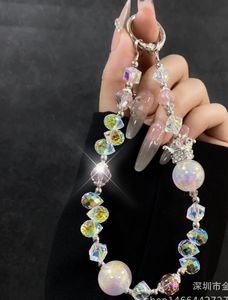 พวงกุญแจโทรศัพท์มือถือคริสตัลรูปดอกกุหลาบสุดหรู ดีไซน์เฉพาะ พร้อมขวดน้ำหอม พวงกุญแจสำหรับกระเป๋าโทรศัพท์ - Product Image 4