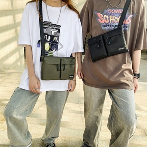 Fungsional Sederhana Serbaguna Kapasitas Besar Warna Polos Kosong Gesper Kantong Tahan Air Nilon Sling Tas Olahraga Travel Messenger - Product Image 1