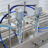 Machine de remplissage horizontale semi-automatique de haute précision en acier inoxydable pour bouteilles de shampoing, d'huile, de savon liquide et de détergent