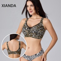 XIANDA OEM Soutien-gorge sans armatures personnalisé pour femme, en maille croisée unie, sans couture, avec crochet arrière surdimensionné, rembourrage push-up, soutien-gorge sans couture