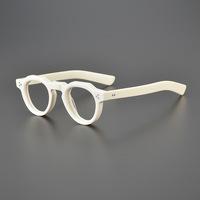 Monture de lunettes épaisse en acétate blanc transparent avec plaque en acétate orange, monture de lunettes épaisse à motif répétitif imitation écaille de tortue ancienne