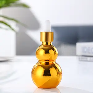 10ml 20ml 30ml 50ml 100ml refillable electric gold-plated hoist type glass oil bottle plastic head dropper