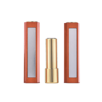 Vente en gros de contenants à rouge à lèvres vides en plastique de luxe écologiques de forme d'ampoule noire, emballage personnalisé de tubes à rouge à lèvres fantaisie