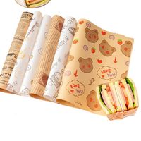 Vente en gros de papier d'emballage sulfurisé de qualité alimentaire avec logo personnalisé pour l'emballage de gâteau pizza snack pain pour hamburgers boules de riz