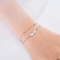 Bracelet à breloques aile d'ange pour femme fille acier inoxydable or double couche perles chaîne bracelets bijoux tendance cadeau d'anniversaire