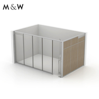 Cloison de réception en verre insonorisée pleine hauteur en aluminium, style moderne et minimaliste M&W, pour bureaux et projets.