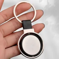 Porte-clés rotatif en métal avec logo personnalisé et sangle en cuir PU, porte-clés rond vierge pour la promotion d'entreprise, cadeau d'entreprise