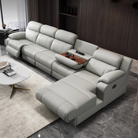 Canapé d'angle moderne et personnalisable en cuir véritable, avec table rabattable 3 places, pour salon - Collection 2026 populaire