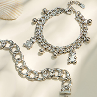 Bracelet à maillons en acier inoxydable plaqué or 18 carats avec pendentif ours, style tendance et cool européen et américain pour femme