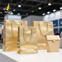 Sacs cadeaux en papier écologiques à rayures verticales dorées avec poignées en corde, impression de logo personnalisée, design de luxe, vente en gros