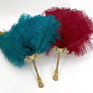 Éventail en plumes d'<span class=keywords><strong>autruche</strong></span> de petite taille en vente en gros Éventail pour séance photo en direct sur scène Éventail pour accessoires de performance - Product Image 1