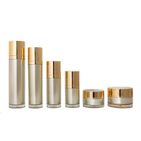 Ensemble de flacons cosmétiques en acrylique avec tête de pompe à vide dorée pour lotions, crèmes et onguents – Matériaux d'emballage pour petites séries