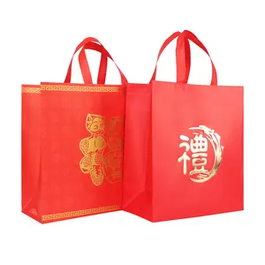 中国からの不織布バッグsichuan huimei生分解性低MOQカスタムダイカット再利用可能なショッピングバッグ中国の新年のギフトバッグ