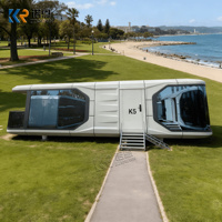 Chambre d'hôtel capsule spatiale préfabriquée en aluminium imperméable personnalisée avec salle de bain et cuisine pour camping en plein air et parc