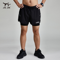 JIEJIN 2027 Nouveaux shorts de sport réfléchissants 2-en-1 noirs unis pour hommes, idéaux pour la course à pied et l'entraînement