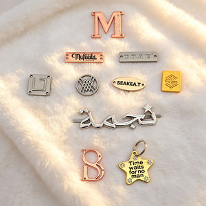 Metal Labels Zinc Alloy Embossed Custom Logo for Hoodies Sweatshirts Casual Garments Factory Wholesale Bulk OEM Service - Product Image 1
