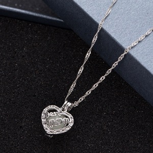 Collier de maman lumineux brille dans le noir, alliage creux peut ouvrir la <span class=keywords><strong>Cage</strong></span> pendentif collier cadeau pour la fête des mères - Product Image 5