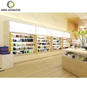 ชั้นวางสินค้าร้านเครื่องสำอาง เฟอร์นิเจอร์ร้านน้ำหอมแฟชั่น สำหรับตกแต่งร้านผลิตภัณฑ์ดูแลผิว และการออกแบบร้านแบรนด์น้ำหอม - Product Image 1