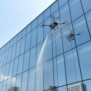 Drone de <span class=keywords><strong>nettoyage</strong></span> à 4 axes <span class=keywords><strong>et</strong></span> pompe à eau, tuyau d'arrosage pour le <span class=keywords><strong>nettoyage</strong></span> personnel <span class=keywords><strong>et</strong></span> commercial des fenêtres, des façades de bâtiments, des murs, des toits - Product Image 1