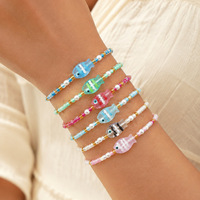 Bracelet extensible fait main en perles de verre et perles de rocaille colorées, motif poisson, pour femme, bijou de plage tropical délicat