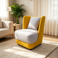 Fauteuil d'appoint individuel minimaliste jaune pour hall d'hôtel ou espace invitées, avec coussin rembourré confortable et haute résilience