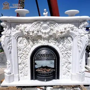Camino in marmo bianco per interni naturale intagliato con decorazioni per la casa in stile europeo