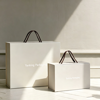 Boîte d'emballage personnalisée de luxe en carton pliable avec aimant, logo personnalisé, pour vêtements de marque, avec poignée en ruban
