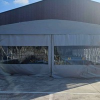 Tente motorisée imperméable en PVC, design rétractable pour atelier d'usine, structure en acier galvanisé, roues en nylon, utilisation toutes saisons