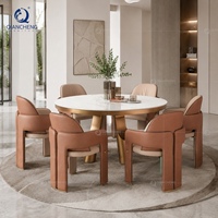 Table de salle à manger ronde de luxe pour projet hôtelier, plateau en pierre frittée de 12 mm, base en or rose brossé, mobilier commercial pour restaurant